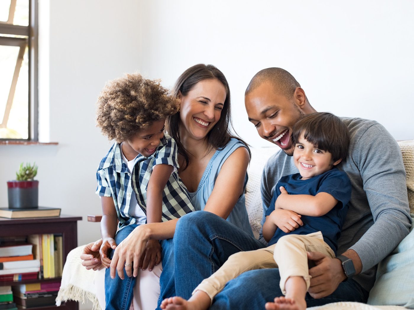 A family laughing together at home